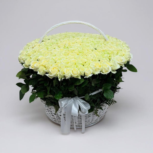 white roses in the basket