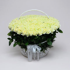 white roses in the basket