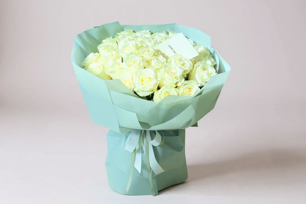 white roses in bouquet