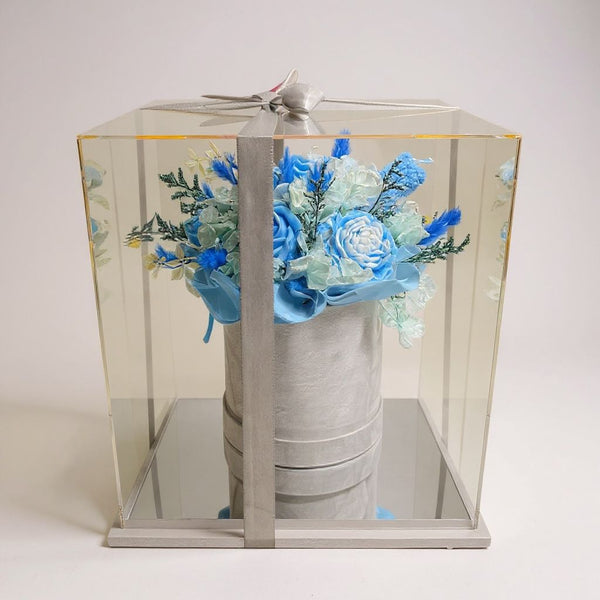 blue candle arrangement with box