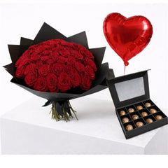 red roses bouquet with chocolate