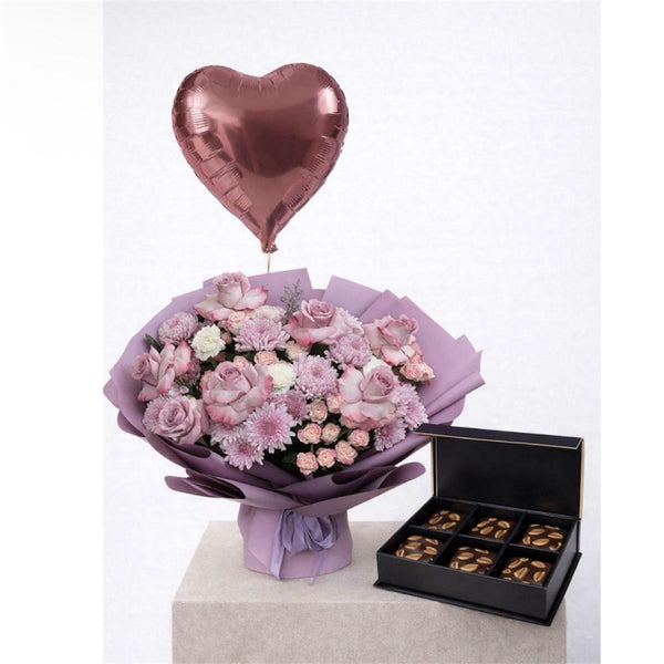 purple bouquet with chocolate